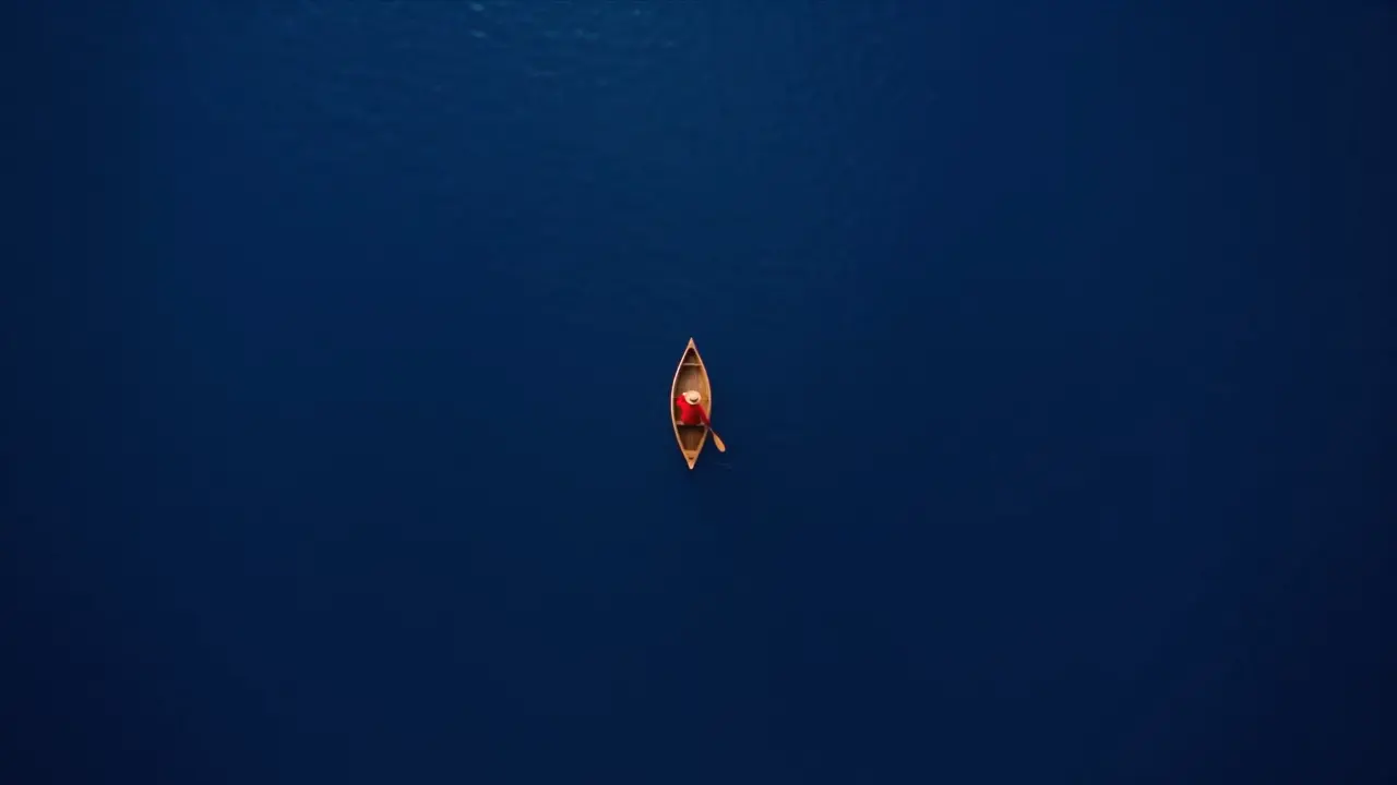 A canoe dissolving into paint